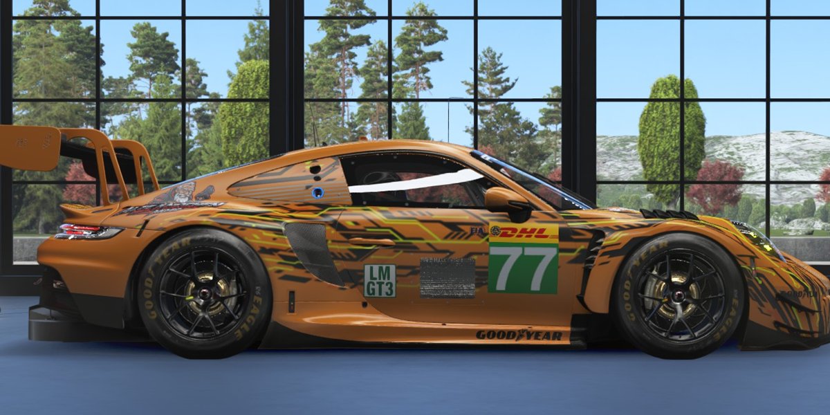 Porsche 911 GT3 R von der Seite vor der Fensterfront